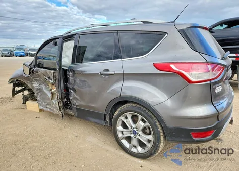 2014 Ford Escape Titanium z USA, uszkodzony, nr VIN 1FMCU9J92EUD62197
